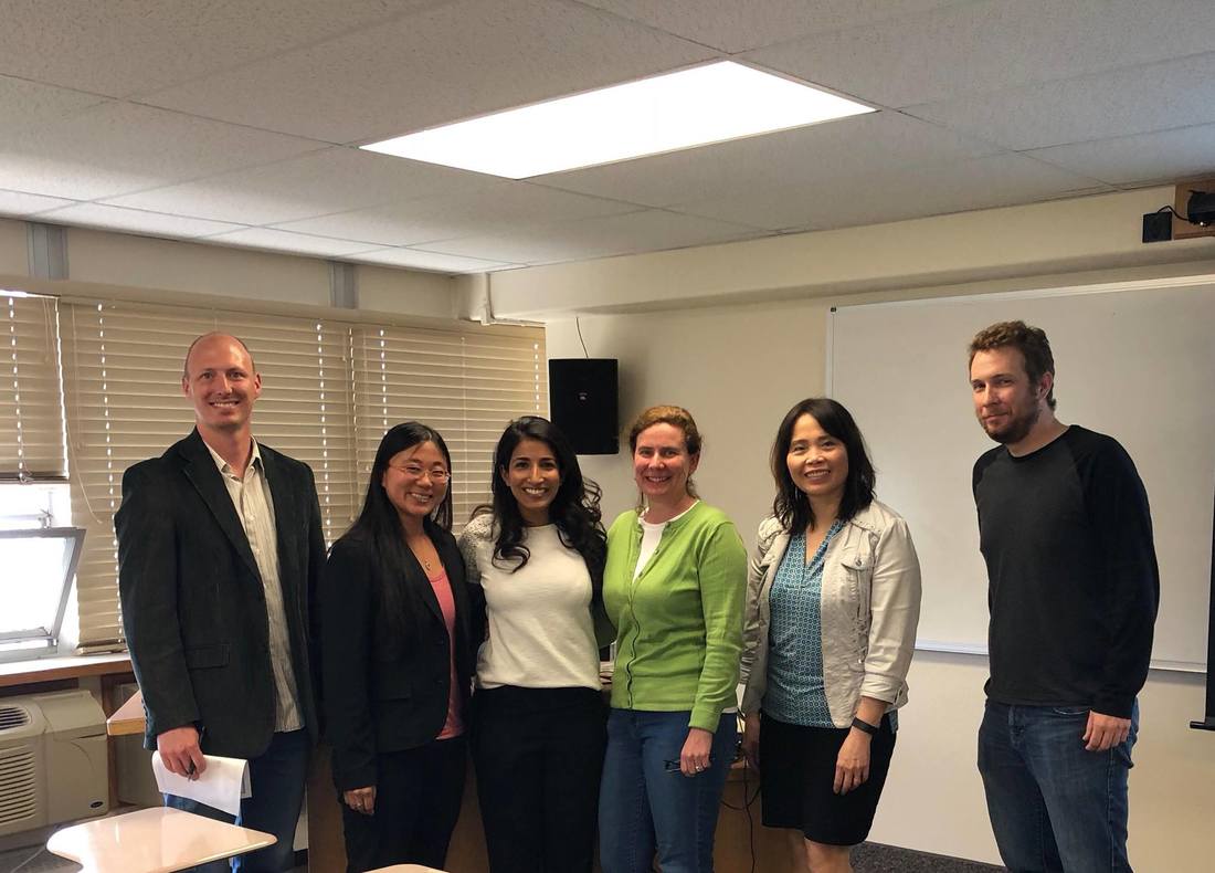 Jabeene Bhimji and her dissertation committee at the completion of her successful defense