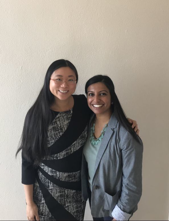 Photo of Dr. Xu and Bindal Makwana. Standing together after Bindal successfully defended her Master's Thesis.